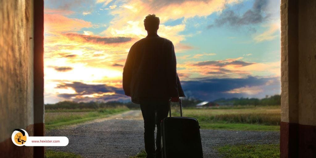 man holding luggage photo